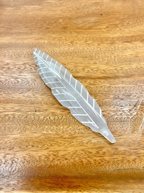 Close-up of the unique Selenite Feather Incense Holder with intricate detail, embodying spiritual serenity.
