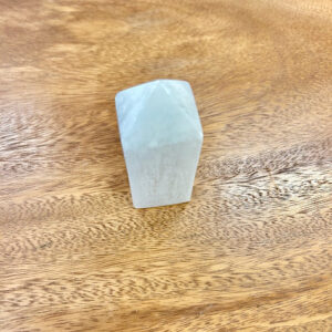 Side view of the Selenite Obelisk, highlighting the quality of the selenite and the sharp edges of the crystal.