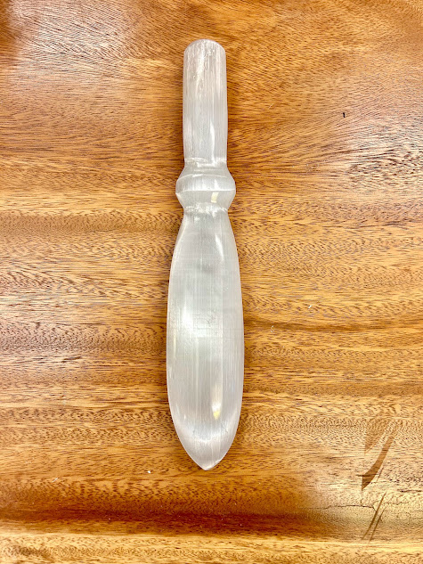 Full view of Selenite Large Knife on wooden background for contrast