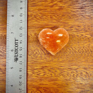 Selenite Small Heart - Orange and White with ruler for scale