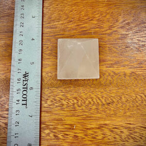 Top view of Selenite Small Pyramid showcasing its pristine clarity and natural beauty