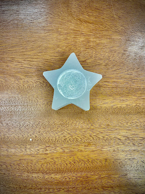 Top view of the Selenite Star Candle Holder, emphasizing its symmetrical design and the central cavity for a candle.
